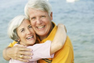 Couple embracing at beach